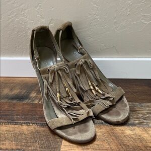 Gucci brown suede fringe slingback heels featuring gold-tone accents